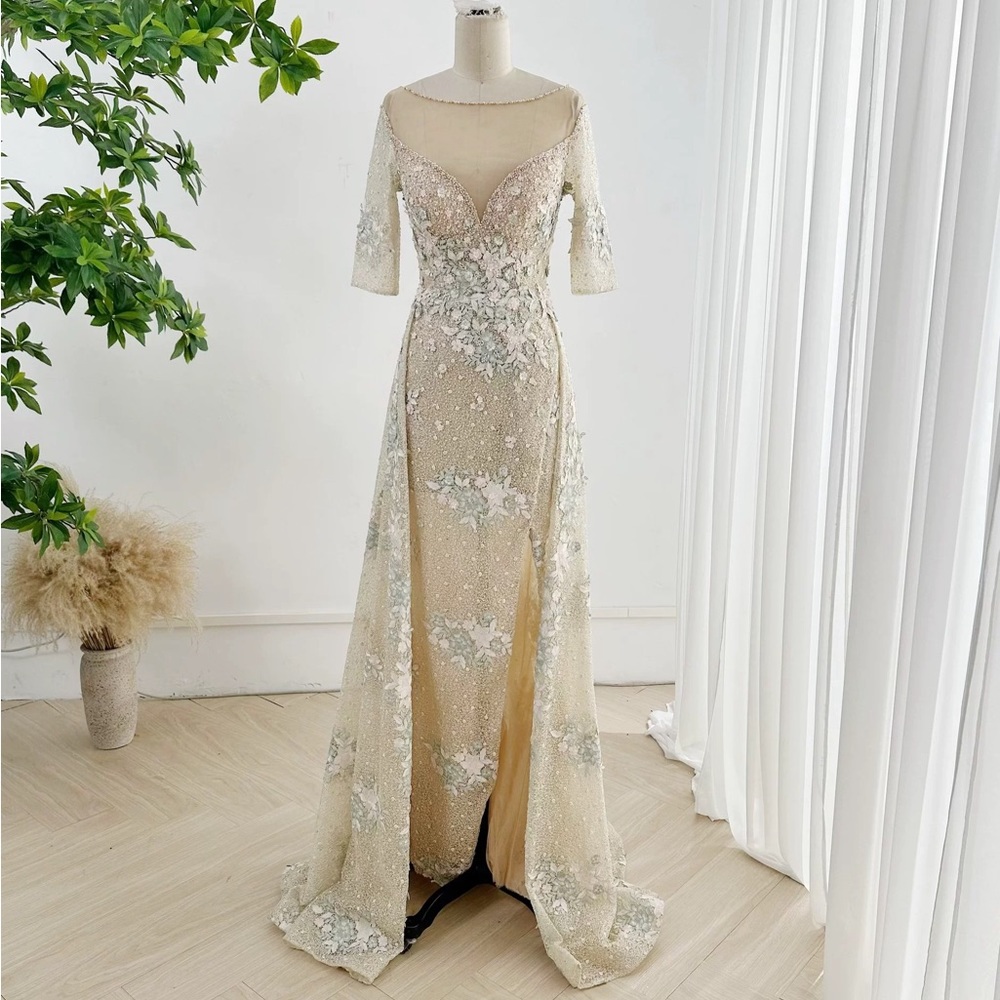 Gown size 4(S) Champagne/ three-quarter sleeve/slim/small tail performance dress
